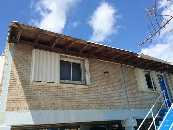 Miami family displaced after abandoned structure collapses onto adjacent home during overnight storm and demolition preparation